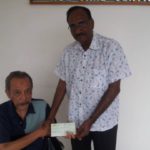 IMG-20180831-M Govind Nair handover JWF to Nizamuddin Mohamed at Subang Jaya Nursing Home.