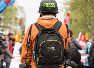 How many more journalists must die, RSF? A reporter at a protest.