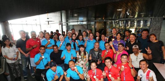 NPC wins 2nd edition of Sabah Media-NPC Goodwill Games (Second row from bottom, third from right) Ang, Ahirudin, Deputy Women, Family and Community Development Minister Lim Hui Ying, and Christopher pose with National Press Club (NPC) and Sabah media participants at the Penang Bowl, in conjunction with the second edition of the Sabah Media-NPC Goodwill Games.